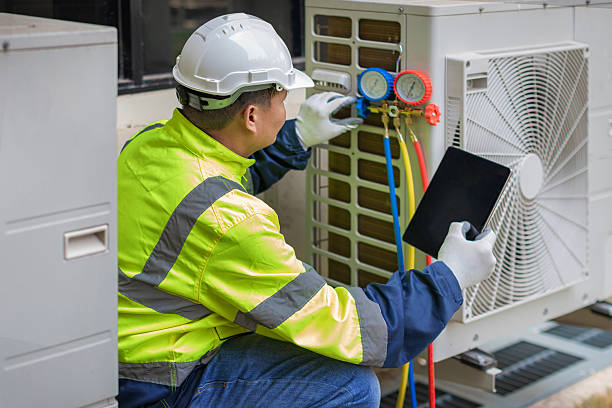 Professional Hvac technician working in Sheldonville, MA
